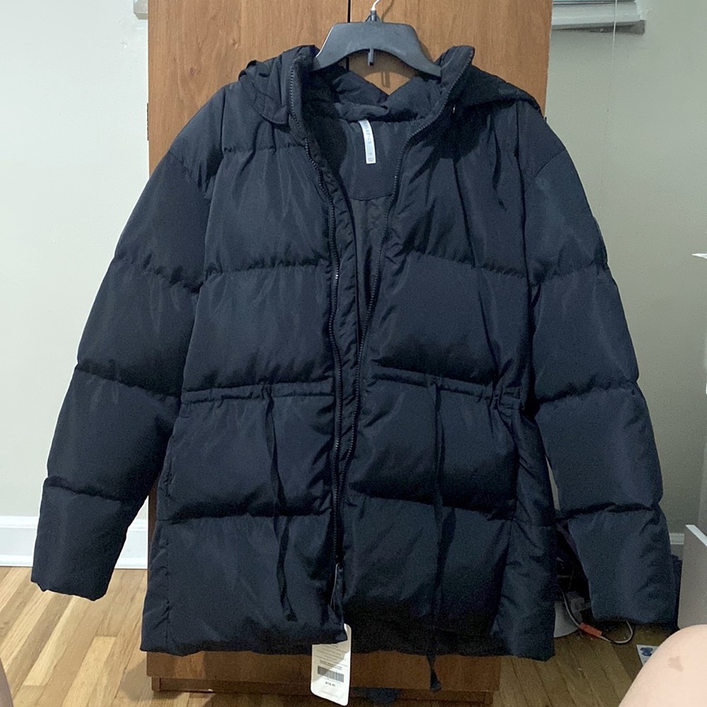 Women’s black puffer winter coat from Fabletics (New), size Medium